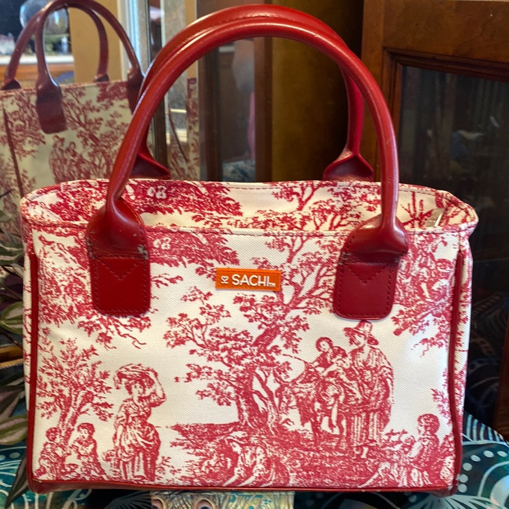 Sachi- burgundy lunch tote in old americano print.